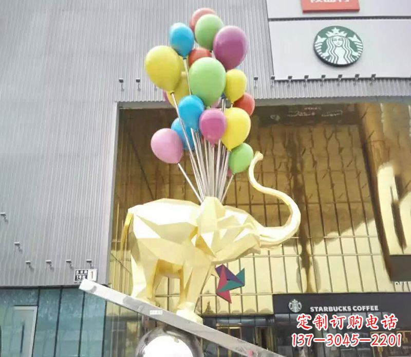 内蒙古不锈钢踩球的小象雕塑