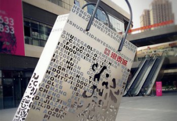 内蒙古购物袋雕塑-步行街室外锻造刻字不锈钢购物袋雕塑