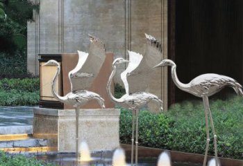 内蒙古鹤雕塑-公园不锈钢镜面喷泉中的鹤雕塑